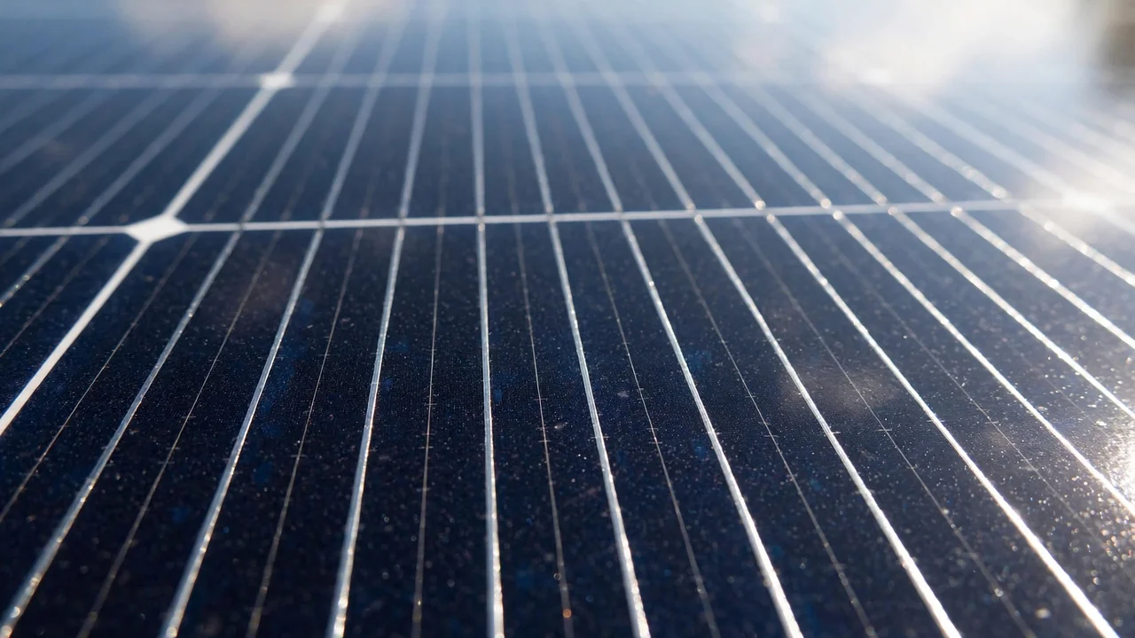 Close-up of N-type solar panel photovoltaic cells and busbars of the type used in Jinko 580W modules